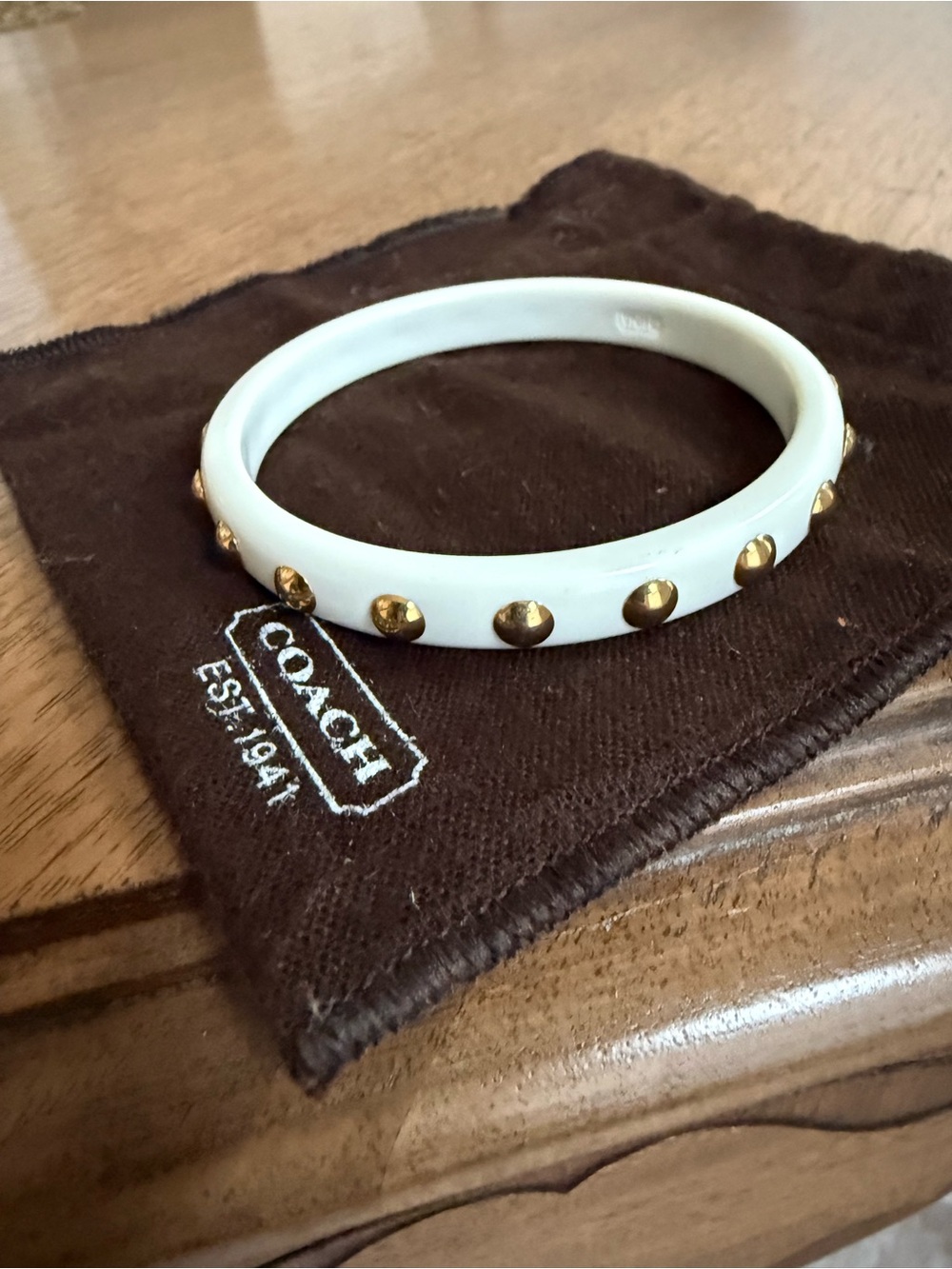 Coach White Resin Bangle with Gold Stud Accents